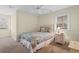 Inviting bedroom with a cozy bed, ceiling fan, and carpeted flooring at 141 Cayman Loop, Pawleys Island, SC 29585