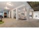 Spacious garage with car and ample storage space, perfect for parking and hobbies at 141 Cayman Loop, Pawleys Island, SC 29585