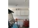 Organized garage featuring ample white cabinet storage space above and functional organization at 1432 Seahouse Ct., Surfside Beach, SC 29575