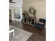 Cozy living room featuring wood floors, stylish furnishings, and an open layout to the bright space at 1432 Seahouse Ct., Surfside Beach, SC 29575