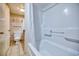 Clean bathroom with white tile and standard fixtures at 1501 Ocean Blvd. S # 242, Myrtle Beach, SC 29577