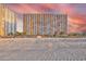 Beachfront resort featuring an orange facade and a beautiful sandy beach at 1501 Ocean Blvd. S # 242, Myrtle Beach, SC 29577