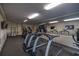 Fitness center with treadmills, elliptical machines, and mounted TVs for entertainment at 1501 Ocean Blvd. S # 242, Myrtle Beach, SC 29577