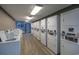 Well-equipped laundry room with modern, stacked washer and dryer units at 1501 Ocean Blvd. S # 242, Myrtle Beach, SC 29577
