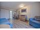 Cozy living room with seating, dining area, and modern amenities at 1501 Ocean Blvd. S # 242, Myrtle Beach, SC 29577