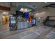 Lobby area featuring a Starbucks coffee kiosk, stairs, and tiled flooring at 1501 Ocean Blvd. S # 242, Myrtle Beach, SC 29577