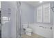Bathroom features a glass shower enclosure, tub, toilet, and neutral tiling at 1551 Spinnaker Dr. # 5312, North Myrtle Beach, SC 29582