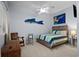 Cozy bedroom features unique decor, a comfortable bed, and a calming color scheme at 1551 Spinnaker Dr. # 5312, North Myrtle Beach, SC 29582