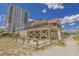 Charming beachside property with a wooden fence, perfect for coastal relaxation and enjoyment of the outdoors at 1551 Spinnaker Dr. # 5312, North Myrtle Beach, SC 29582