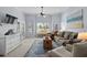 Inviting living room with plush seating, decorative rug, and ample natural light, creating a comfortable space at 1551 Spinnaker Dr. # 5312, North Myrtle Beach, SC 29582