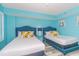 Bright bedroom with two beds and coastal decor offering a comfortable stay at 161 Sea Watch Dr. # 601, Myrtle Beach, SC 29572
