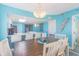 Dining room area featuring table, chairs, chandelier, view of kitchen and doorway at 161 Sea Watch Dr. # 601, Myrtle Beach, SC 29572