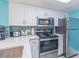 Close-up of kitchen showcasing stainless steel appliances and sleek countertop at 161 Sea Watch Dr. # 601, Myrtle Beach, SC 29572