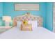 Comfortable bedroom with stylish decor, a painting, and bedside table lamp at 161 Sea Watch Dr. # 601, Myrtle Beach, SC 29572