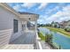 Enjoy scenic water views from this spacious balcony with white railings and durable tile flooring at 1619 Eastover Ln., North Myrtle Beach, SC 29582