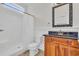 Charming bathroom with a shower and vanity with granite countertop at 1619 Eastover Ln., North Myrtle Beach, SC 29582