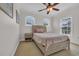 Comfortable bedroom featuring a wooden bed frame and window with natural light at 1619 Eastover Ln., North Myrtle Beach, SC 29582
