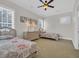 Cozy bedroom with twin beds, neutral tones, and natural lighting at 1619 Eastover Ln., North Myrtle Beach, SC 29582
