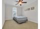 Bedroom with carpet, a ceiling fan, and a window allowing lots of natural light at 1619 Eastover Ln., North Myrtle Beach, SC 29582