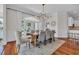 Elegant dining room featuring a large wooden table and stylish chandelier at 1619 Eastover Ln., North Myrtle Beach, SC 29582
