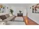 Spacious living room featuring wood floors, comfortable seating, an area rug and artwork at 1619 Eastover Ln., North Myrtle Beach, SC 29582