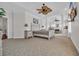 Spacious main bedroom with sitting area, tray ceilings, and large windows for ample natural light at 1619 Eastover Ln., North Myrtle Beach, SC 29582