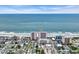 Aerial view of the resort community, oceanfront location, nearby commercial district, and beach at 1625 S Ocean Blvd. # 211, North Myrtle Beach, SC 29582