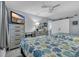 Bedroom with two beds, TV, dresser, and coastal decor at 1625 S Ocean Blvd. # 211, North Myrtle Beach, SC 29582