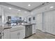 Kitchen with stainless steel dishwasher, granite countertops, and an ocean view at 1625 S Ocean Blvd. # 211, North Myrtle Beach, SC 29582