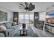 Comfortable living room featuring beach views, stylish decor and a unique fan at 1625 S Ocean Blvd. # 211, North Myrtle Beach, SC 29582