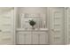 Elegant bathroom with double vanity, large mirror, and neutral color scheme at 1740 Hunting Harris Ct # 9, Ocean Isle Beach, NC 28469