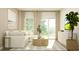 Bright living room with comfortable seating, natural light, and stylish decor at 1740 Hunting Harris Ct # 9, Ocean Isle Beach, NC 28469