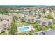 Aerial view of the resort community featuring residential buildings, pool, landscaping and parking at 1900 Duffy St. # L4, North Myrtle Beach, SC 29582