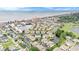 Stunning aerial view of a community near the beach and the ocean with a pool, lake, and golf course at 1900 Duffy St. # L4, North Myrtle Beach, SC 29582