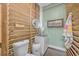 Unique outdoor bathroom with a sink, toilet, and natural wood decor at 191 Grackle Ln., Pawleys Island, SC 29585