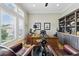Home office with natural light, hardwood floors, shelving, and desk at 191 Grackle Ln., Pawleys Island, SC 29585