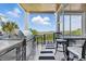Outdoor kitchen and dining area with stainless steel grill and views of the ocean at 191 Grackle Ln., Pawleys Island, SC 29585
