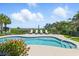 Beautiful in-ground pool featuring lounge chairs overlooking a marsh and waterway, perfect for relaxation and enjoying nature at 191 Grackle Ln., Pawleys Island, SC 29585