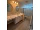 Bathroom featuring double vanity, shower-tub combo, and tile flooring at 1980 Bent Grass Dr. # F, Surfside Beach, SC 29575