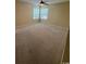 Bedroom with neutral carpet, ceiling fan, and window providing natural light at 1980 Bent Grass Dr. # F, Surfside Beach, SC 29575