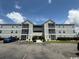 Condo building with symmetrical facade and neatly kept landscaping at 1980 Bent Grass Dr. # F, Surfside Beach, SC 29575