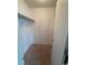 Walk-in closet featuring carpet floors, wire shelving, and storage space at 1980 Bent Grass Dr. # F, Surfside Beach, SC 29575