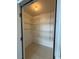 Spacious walk-in pantry with wire shelving provides ample storage for all your grocery needs at 1980 Bent Grass Dr. # F, Surfside Beach, SC 29575