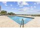 Outdoor pool with brick surround, lounge chairs, and a lovely ocean view for relaxation and recreation at 2001 S Ocean Blvd. # 815, Myrtle Beach, SC 29577