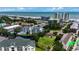 Aerial view of property showing pond and adjacent buildings at 211 N Hillside Dr. # 204, North Myrtle Beach, SC 29582