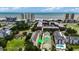 Aerial view of building with ocean views, adjacent buildings, and landscaping at 211 N Hillside Dr. # 204, North Myrtle Beach, SC 29582