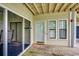 Relaxing private balcony with outdoor seating, providing the perfect space to unwind and enjoy at 211 N Hillside Dr. # 204, North Myrtle Beach, SC 29582