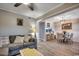 Spacious open living room with dining area and bar seating at 211 N Hillside Dr. # 204, North Myrtle Beach, SC 29582
