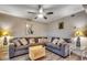 Comfortable living room features a ceiling fan and cozy seating at 211 N Hillside Dr. # 204, North Myrtle Beach, SC 29582