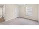 Bedroom features neutral walls, a ceiling light, carpet floors, and a single window at 211 Pine Forest Dr., Conway, SC 29526